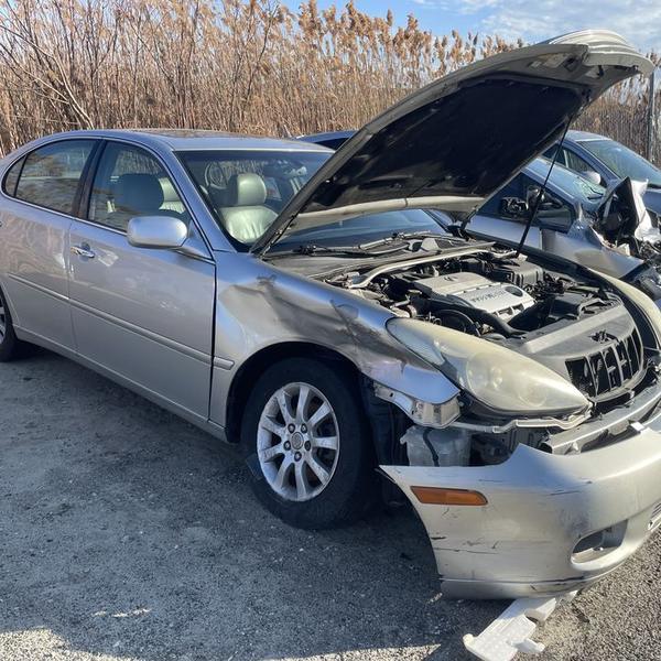 Silver Honda Accord sedan sitting in a driveway, bought for cash