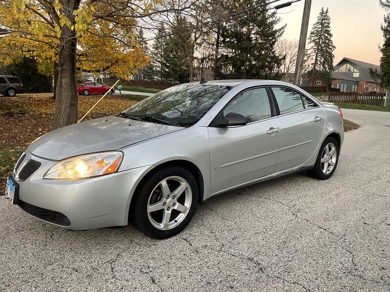 White 2006 Pontiac G6 bought for cash in the northwest suburbs